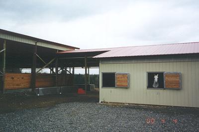 Covered breezeway between barn and arena